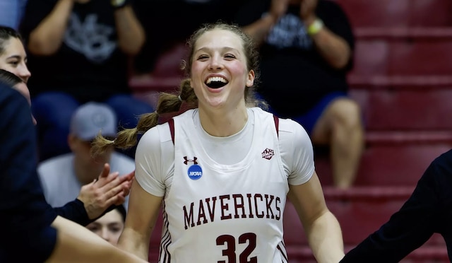 Olivia Reed is all smiles taking the court. 